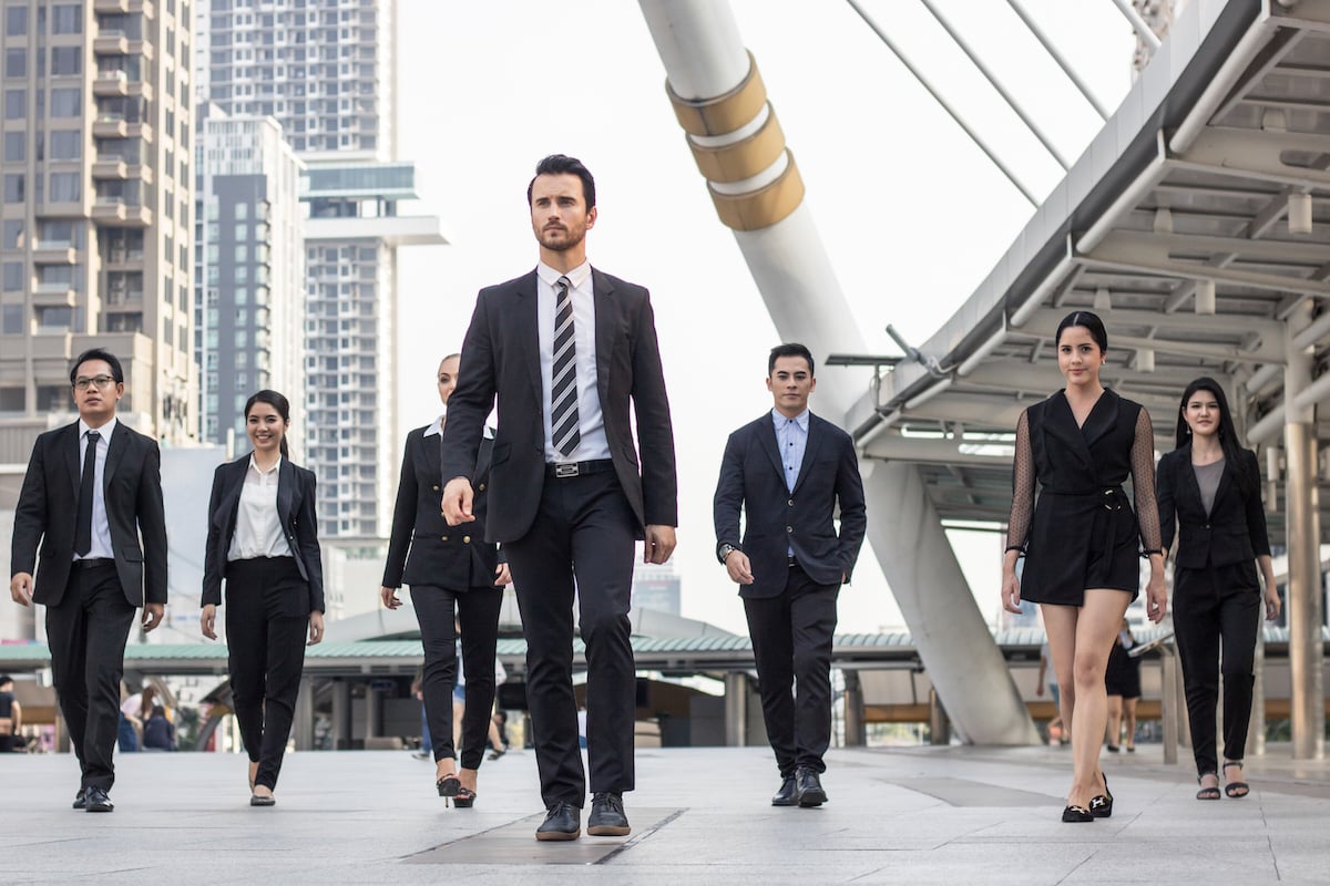 businesspeople-team-of-multi-ethnic-walking-with-2023-01-26-12-45-17-utc